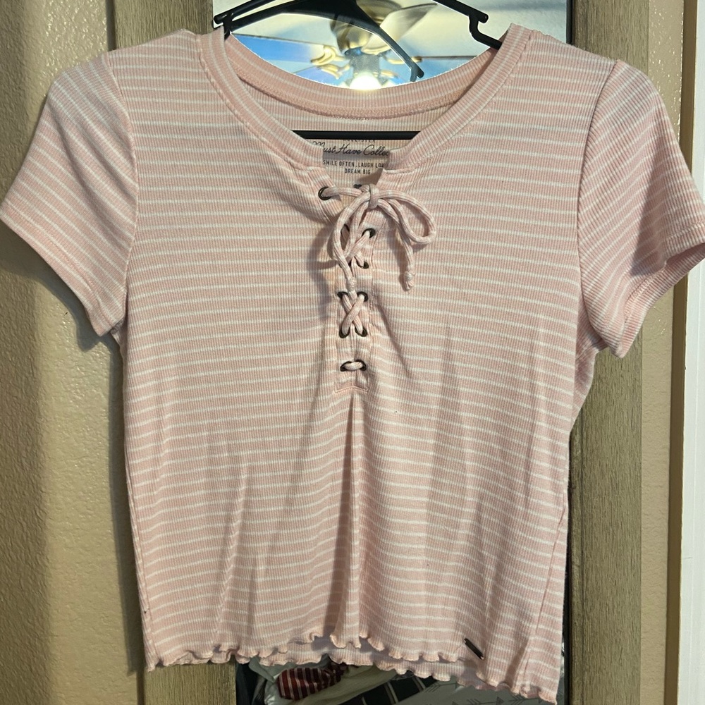 pink and white stripped shirt